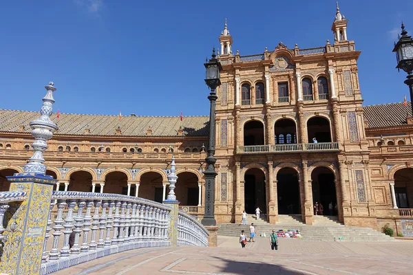 Tiled balustrade and towers of Plaza de España in Seville, Spain